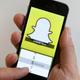 In this photo illustration, the Snapchat app is used on an iPhone in London in 2014.
Peter Macdiarmid/Getty Images